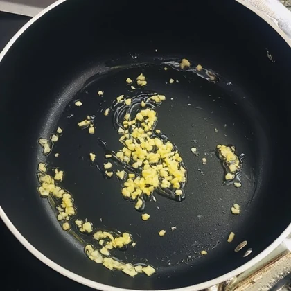 Generated image of garlic and butter in a pan